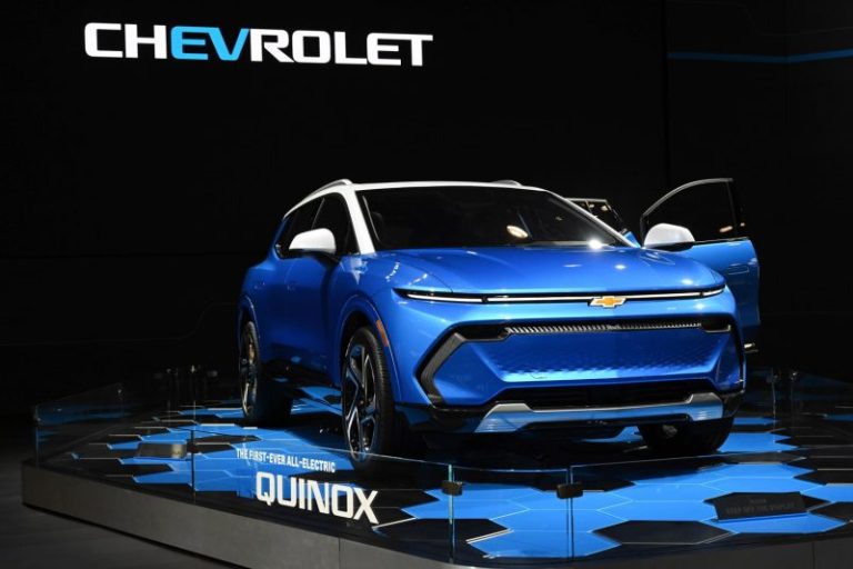 GM slows its EV plans again even as sales grow