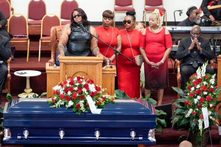 Four people charged with murder after restraining man outside Milwaukee hotel