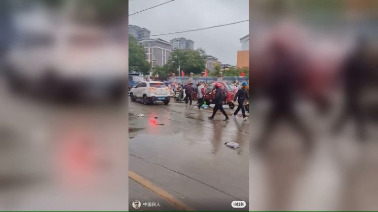 Driver who plowed into school crowd in southern China given suspended death sentence