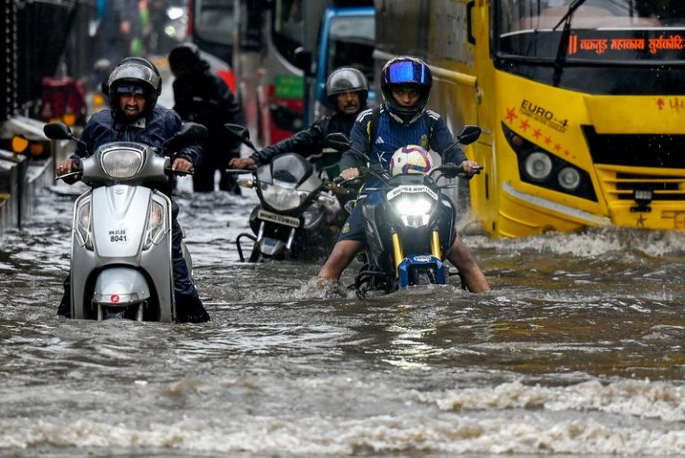 Floods wreak havoc on India’s financial capital as monsoon rains arrive early